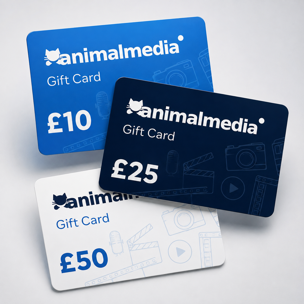 Three Animalmedia gift cards stacked on a light gray background: a blue £10 card, a dark blue £25 card, and a white £50 card.