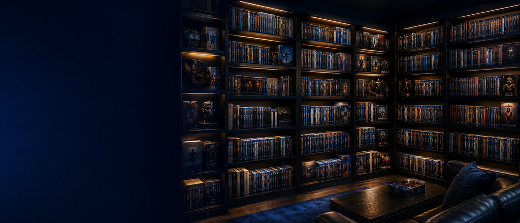 A dark, moody library or study with tall bookshelves filled with dvds and blu rays, warm under-shelf lighting, and a leather armchair in the lower right corner.